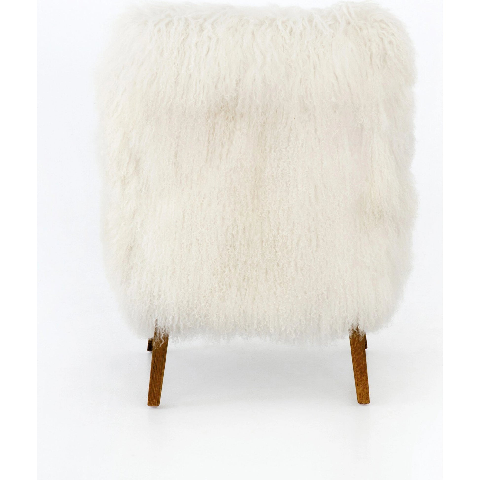 Ashland Armchair by Four Hands in mongolia cream fur, drifted oak. Made from mongolia fur, solid oak, 100% polyester in a modern style.
