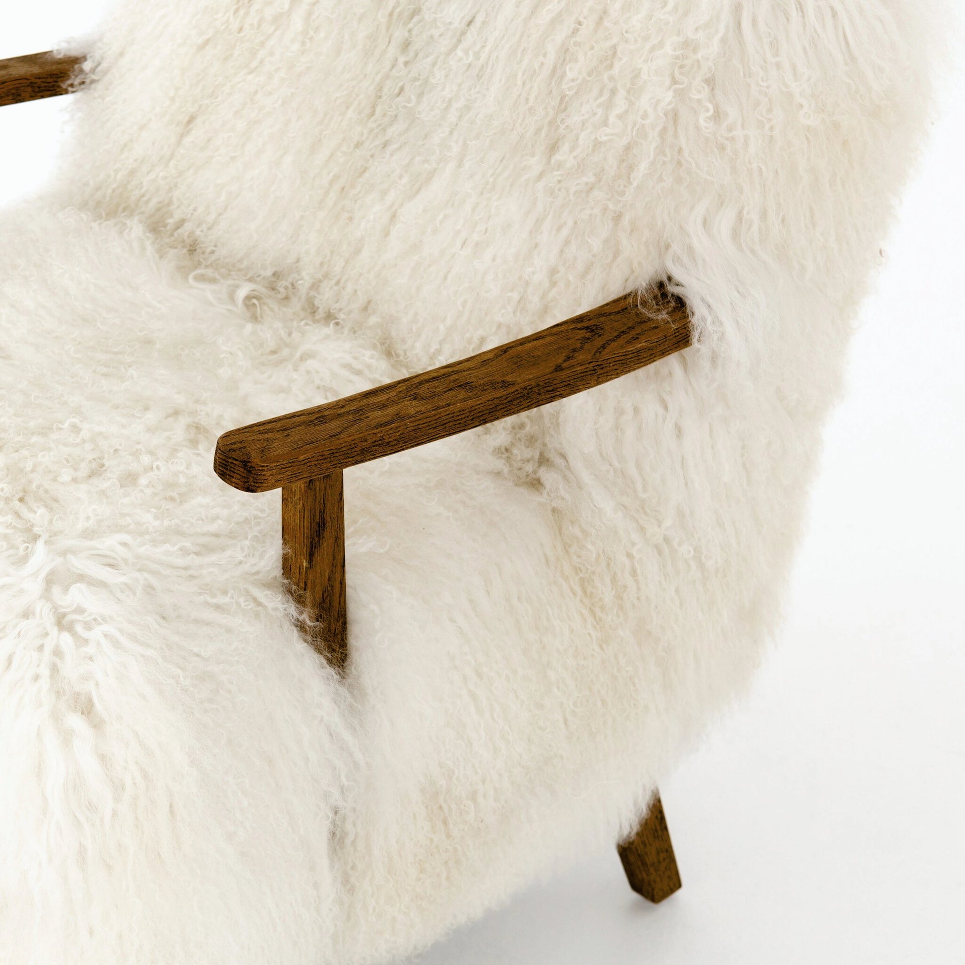 Ashland Armchair by Four Hands in mongolia cream fur, drifted oak. Made from mongolia fur, solid oak, 100% polyester in a modern style.