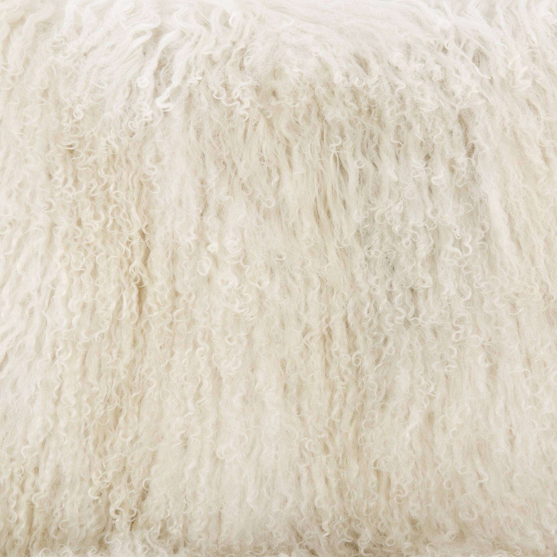 Ashland Armchair by Four Hands in mongolia cream fur, drifted oak. Made from mongolia fur, solid oak, 100% polyester in a modern style.