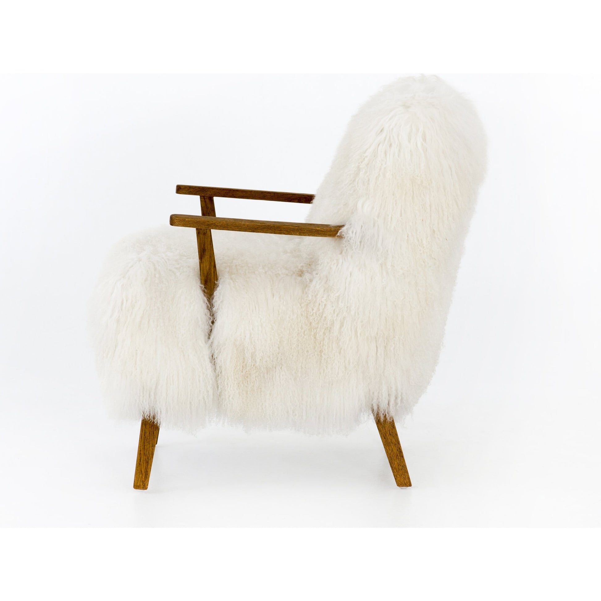 Ashland Armchair by Four Hands in mongolia cream fur, drifted oak. Made from mongolia fur, solid oak, 100% polyester in a modern style.