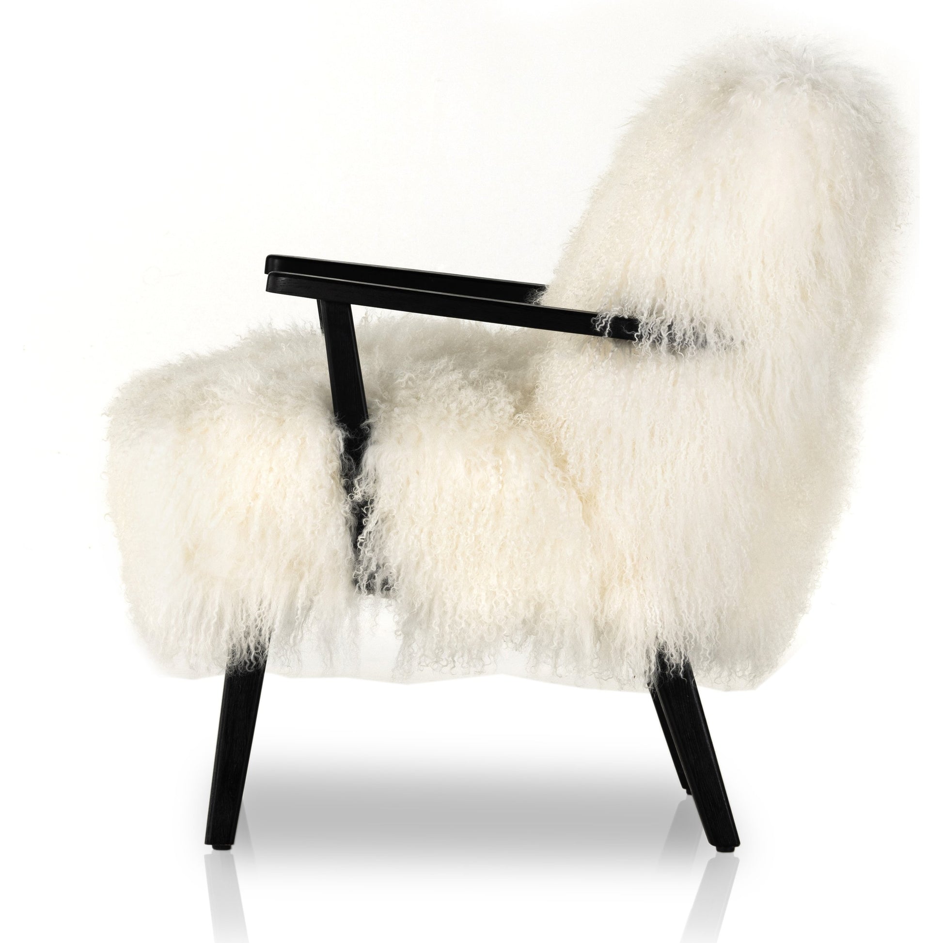 Ashland Armchair by Four Hands in mongolia cream fur, drifted oak. Made from mongolia fur, solid oak, 100% polyester in a modern style.
