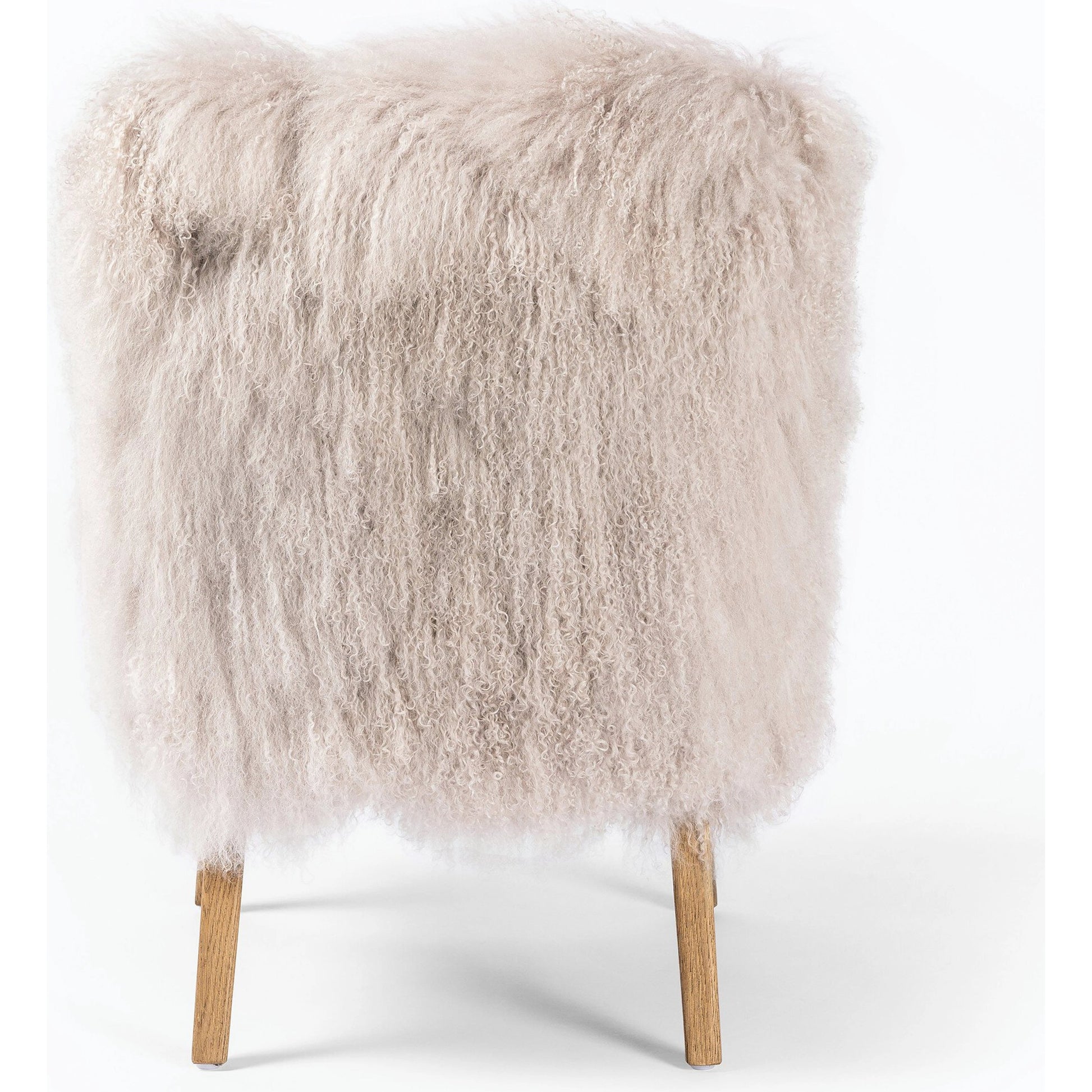 Ashland Armchair by Four Hands in mongolia cream fur, drifted oak. Made from mongolia fur, solid oak, 100% polyester in a modern style.