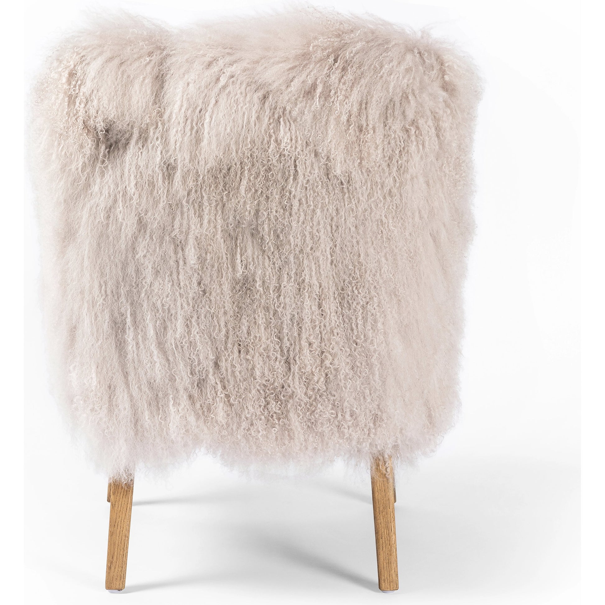 Ashland Armchair by Four Hands in mongolia cream fur, drifted oak. Made from mongolia fur, solid oak, 100% polyester in a modern style.