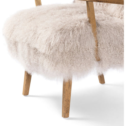 Ashland Armchair by Four Hands in mongolia cream fur, drifted oak. Made from mongolia fur, solid oak, 100% polyester in a modern style.