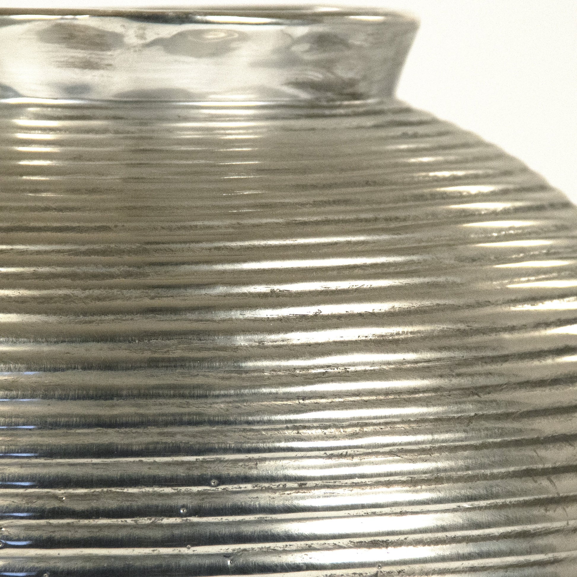 Distressed Metallic Spherical Vase by Zentique in distressed metallic silver and stoneware. Made from stoneware in a modern style.