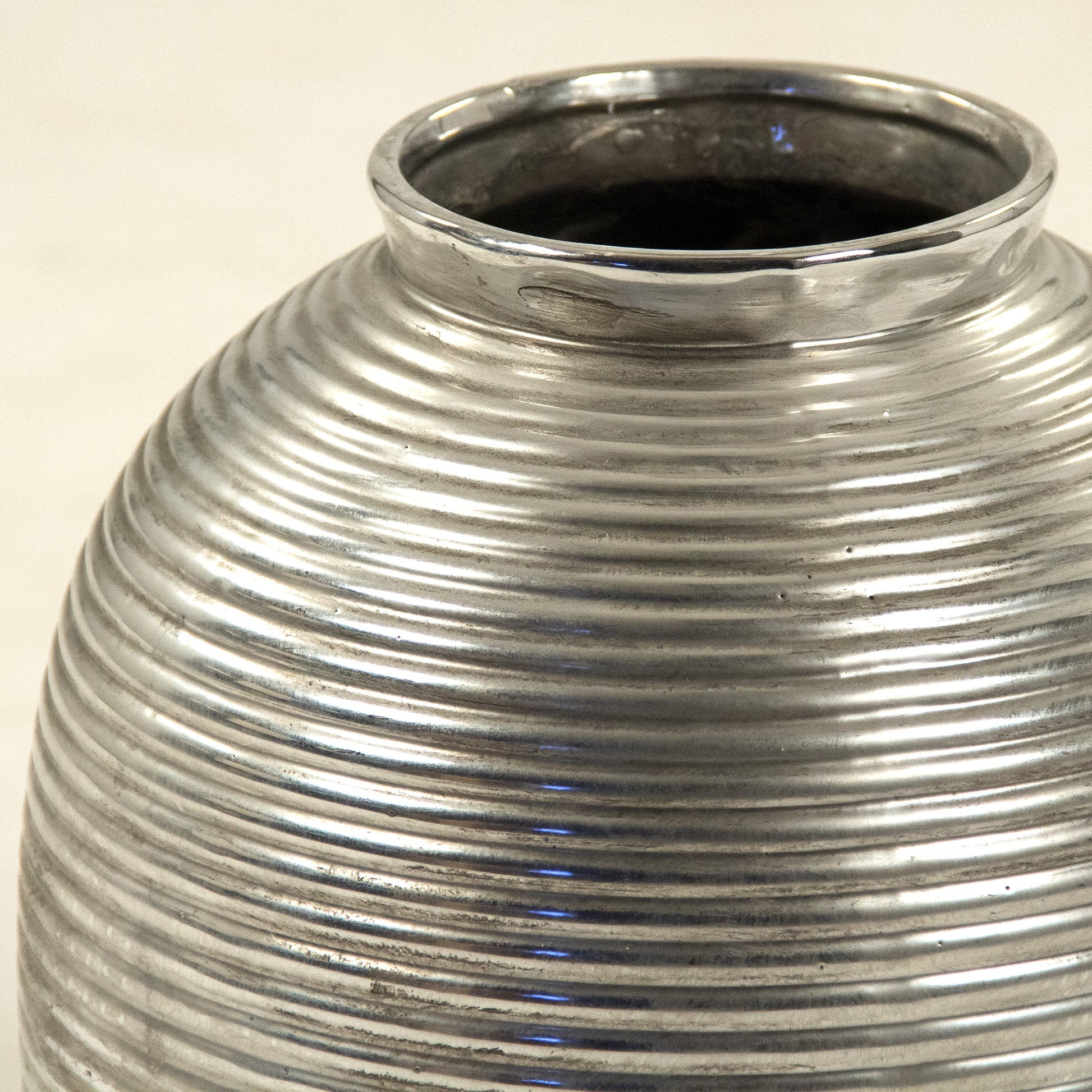 Distressed Metallic Spherical Vase by Zentique in distressed metallic silver and stoneware. Made from stoneware in a modern style.