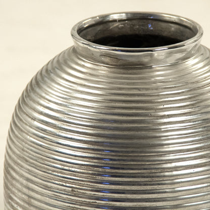 Distressed Metallic Spherical Vase by Zentique in distressed metallic silver and stoneware. Made from stoneware in a modern style.