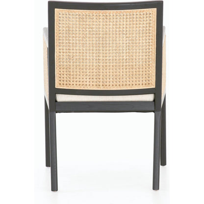 Antonia Cane Dining Armchair by Four Hands in light natural cane, brushed ebony, savile flax. Made from 92% polyester, 8% flax, linen, solid nettlewood, cane in a modern style.