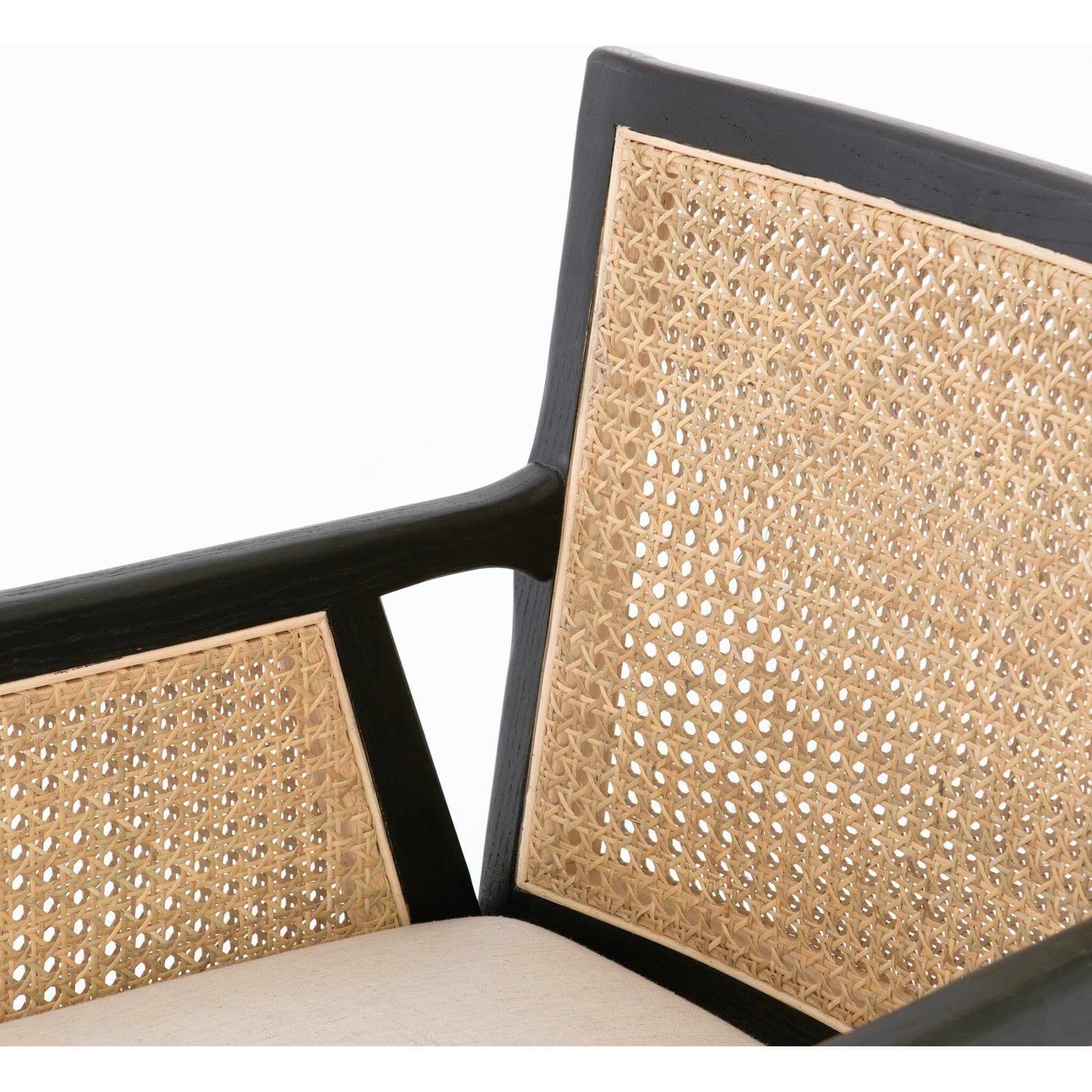 Antonia Cane Dining Armchair by Four Hands in light natural cane, brushed ebony, savile flax. Made from 92% polyester, 8% flax, linen, solid nettlewood, cane in a modern style.