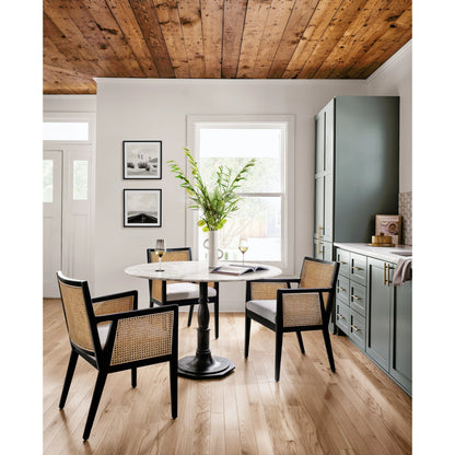 Antonia Cane Dining Armchair by Four Hands in light natural cane, brushed ebony, savile flax. Made from 92% polyester, 8% flax, linen, solid nettlewood, cane in a modern style.