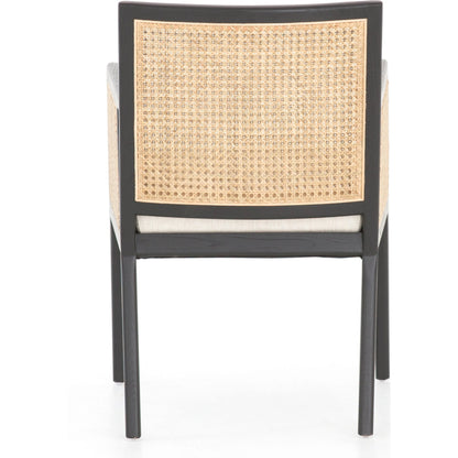 Antonia Cane Dining Armchair by Four Hands in light natural cane, brushed ebony, savile flax. Made from 92% polyester, 8% flax, linen, solid nettlewood, cane in a modern style.