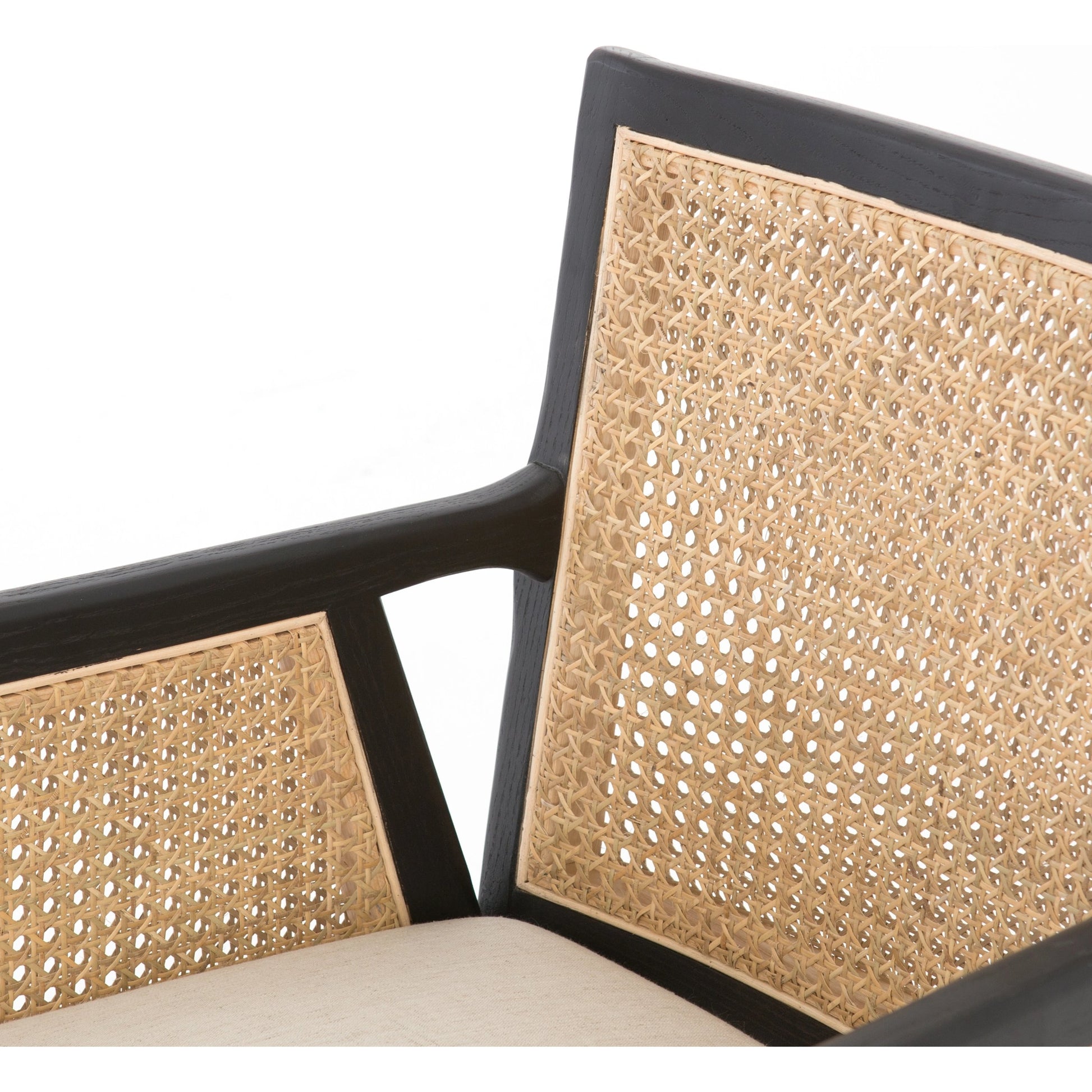 Antonia Cane Dining Armchair by Four Hands in light natural cane, brushed ebony, savile flax. Made from 92% polyester, 8% flax, linen, solid nettlewood, cane in a modern style.