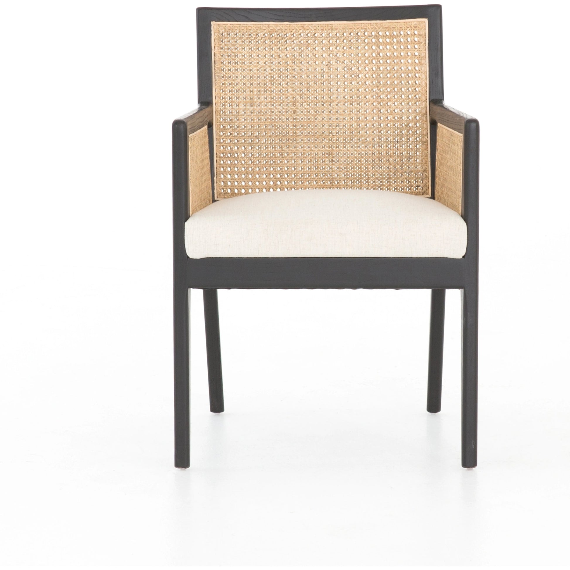 Antonia Cane Dining Armchair by Four Hands in light natural cane, brushed ebony, savile flax. Made from 92% polyester, 8% flax, linen, solid nettlewood, cane in a modern style.