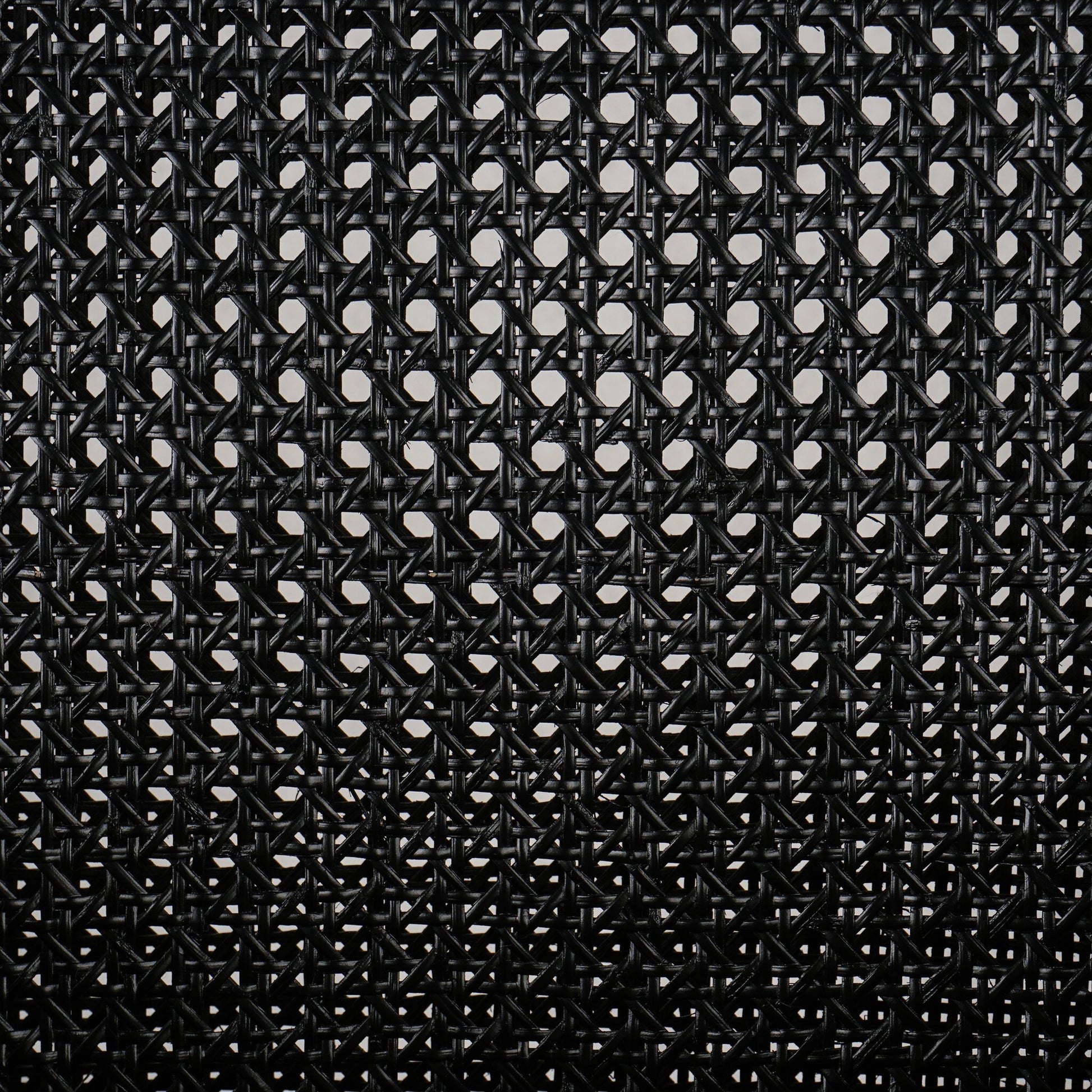 Antonia Cane Dining Armchair by Four Hands in light natural cane, brushed ebony, savile flax. Made from 92% polyester, 8% flax, linen, solid nettlewood, cane in a modern style.