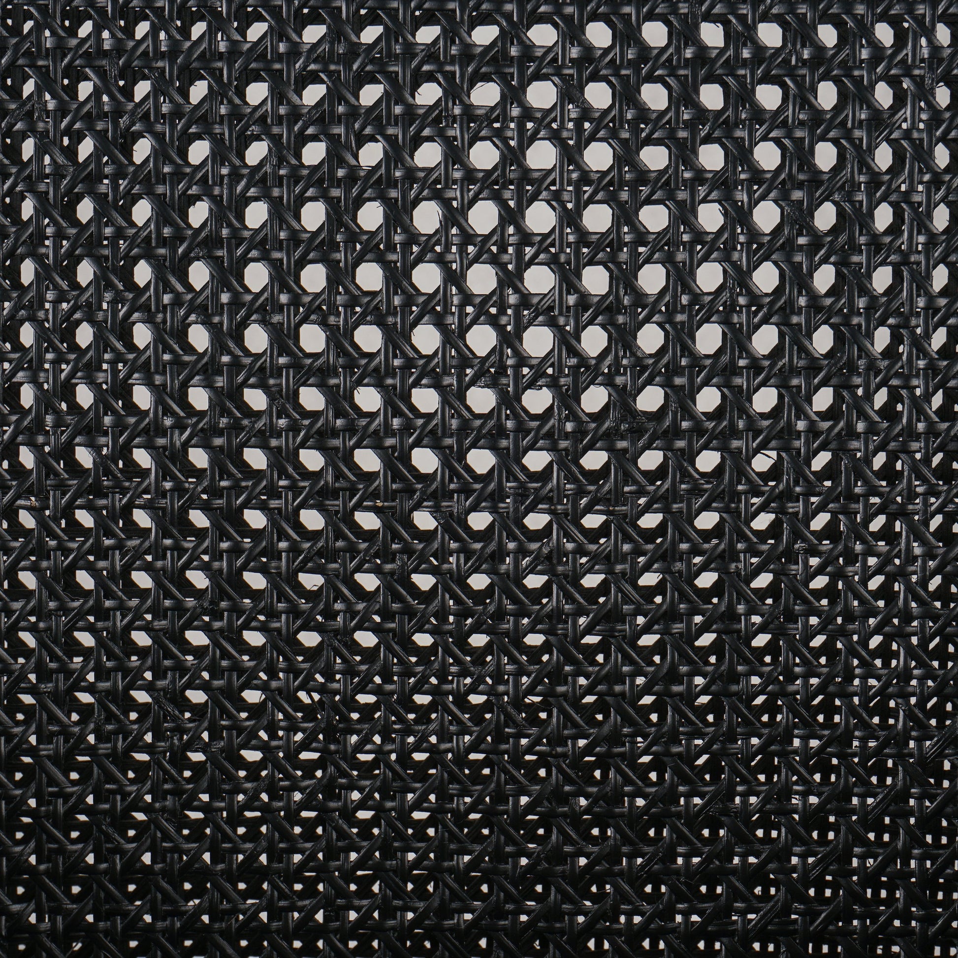 Antonia Cane Dining Armchair by Four Hands in light natural cane, brushed ebony, savile flax. Made from 92% polyester, 8% flax, linen, solid nettlewood, cane in a modern style.