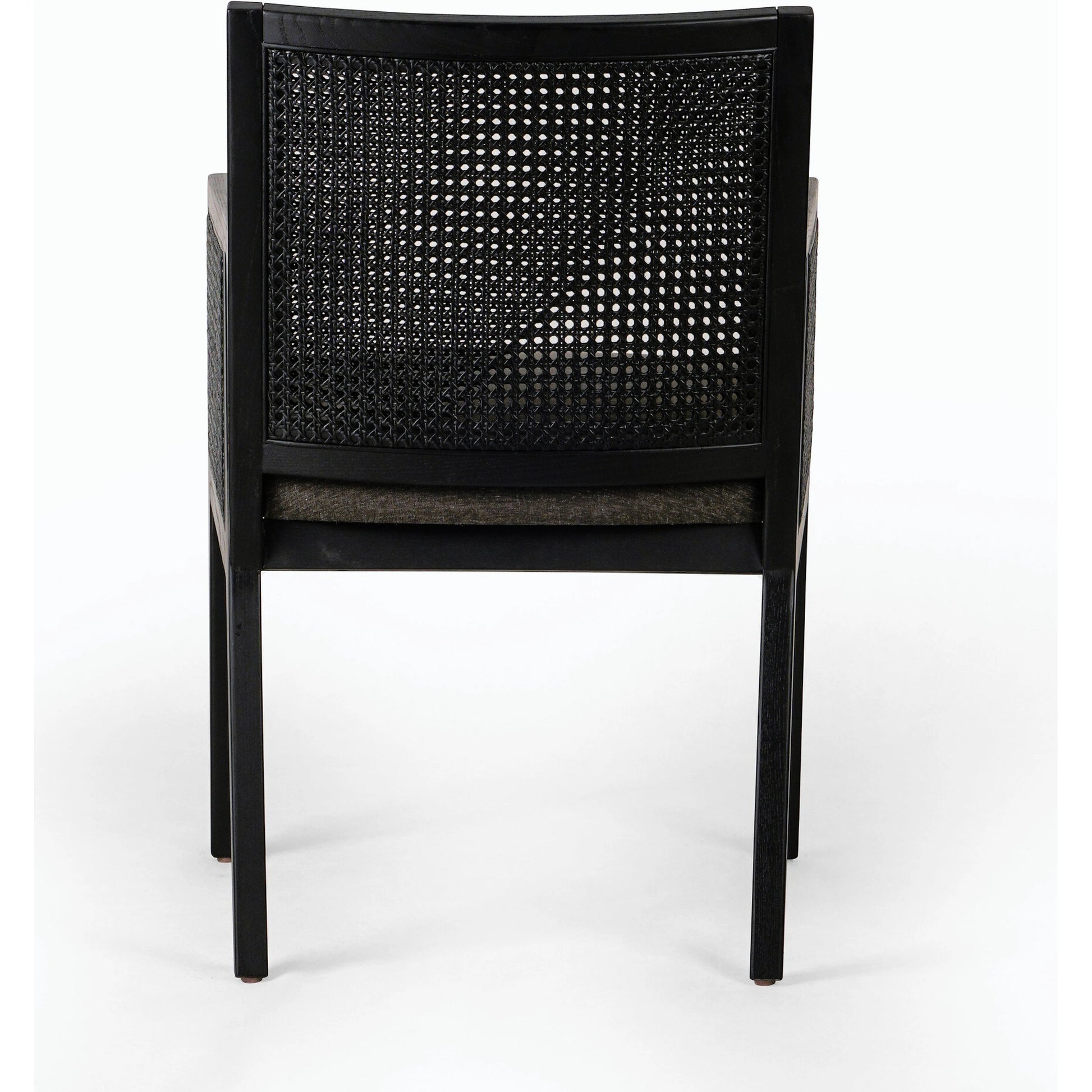 Antonia Cane Dining Armchair by Four Hands in light natural cane, brushed ebony, savile flax. Made from 92% polyester, 8% flax, linen, solid nettlewood, cane in a modern style.