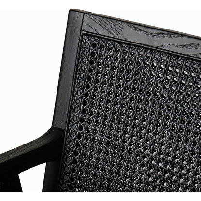 Antonia Cane Dining Armchair by Four Hands in light natural cane, brushed ebony, savile flax. Made from 92% polyester, 8% flax, linen, solid nettlewood, cane in a modern style.