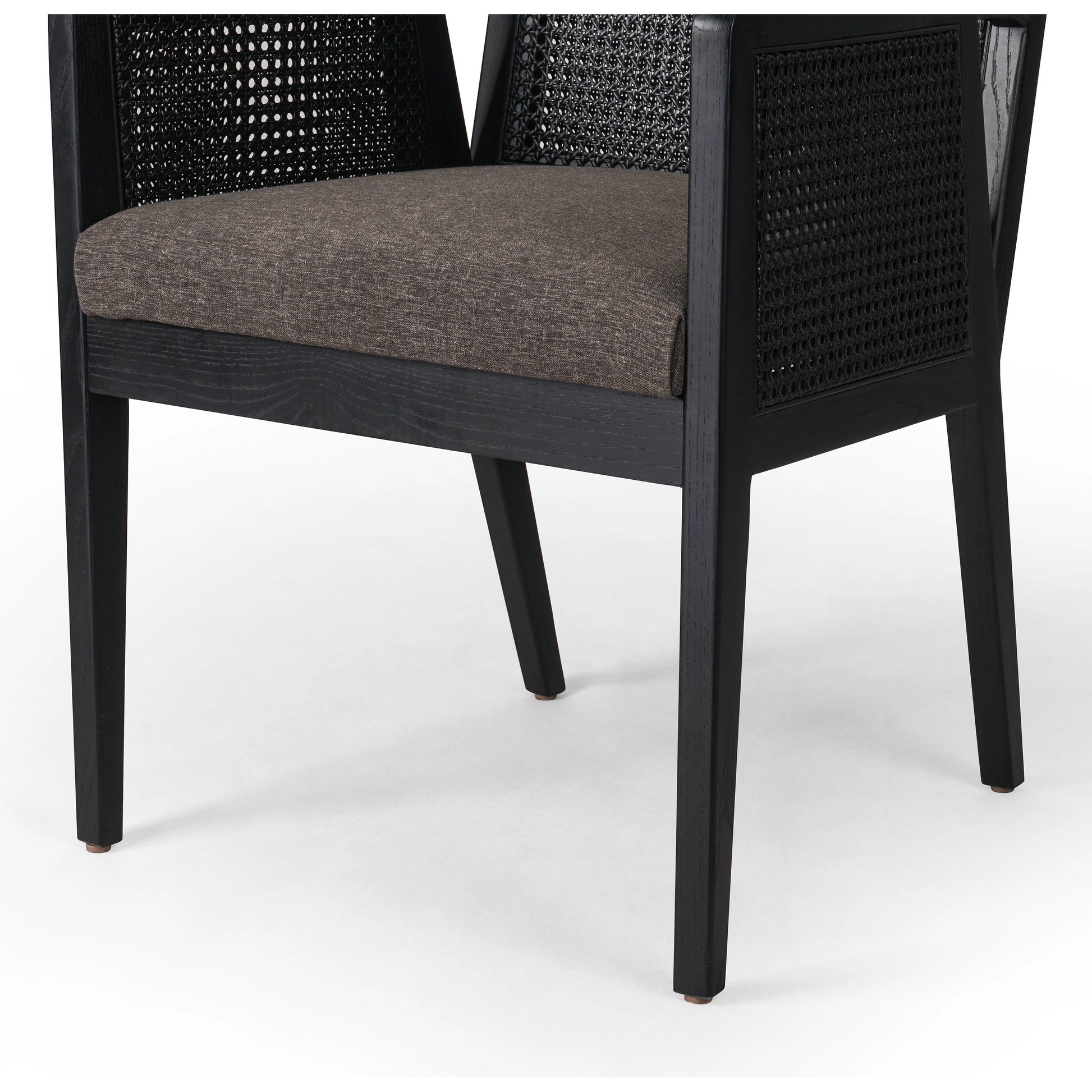 Antonia Cane Dining Armchair by Four Hands in light natural cane, brushed ebony, savile flax. Made from 92% polyester, 8% flax, linen, solid nettlewood, cane in a modern style.