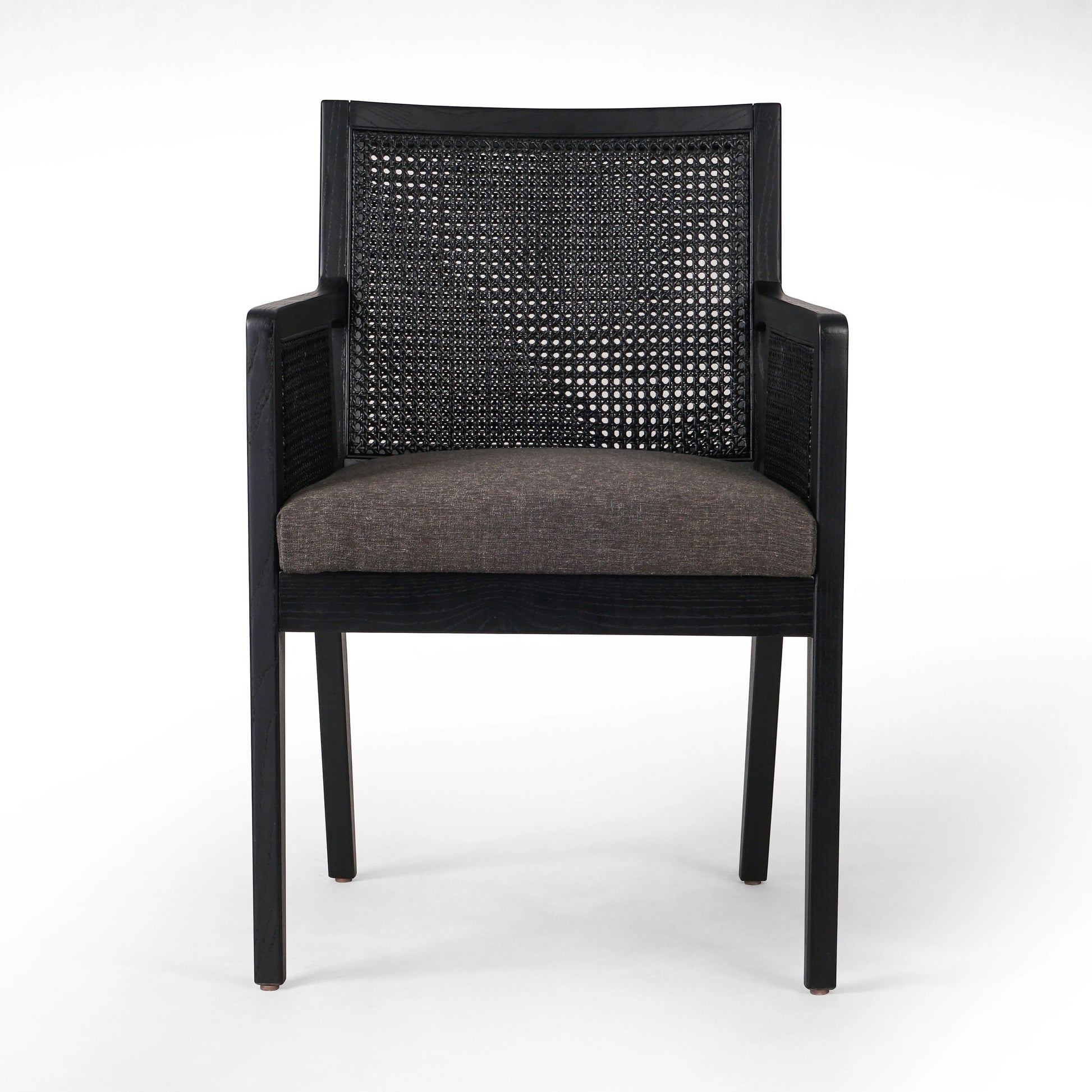 Antonia Cane Dining Armchair by Four Hands in light natural cane, brushed ebony, savile flax. Made from 92% polyester, 8% flax, linen, solid nettlewood, cane in a modern style.