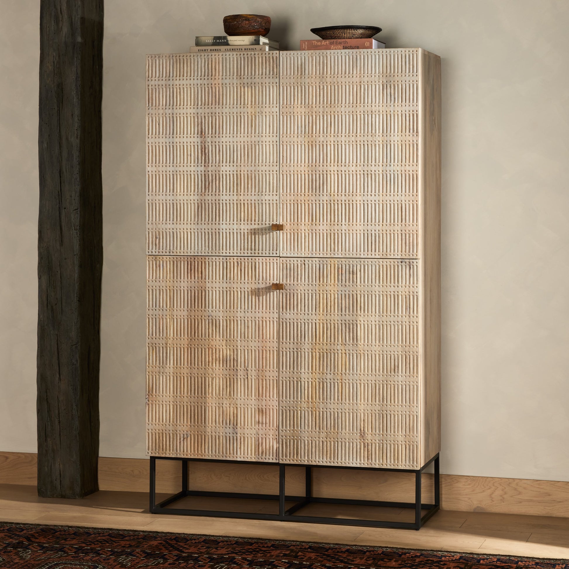 Kelby Cabinet by Four Hands in gunmetal, carved vintage brown, vintage brown. Made from solid mango, iron in a modern style.