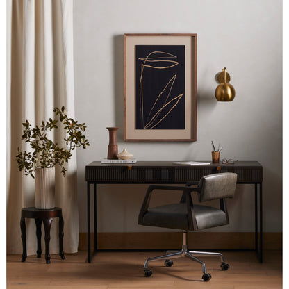 Kelby Writing Desk by Four Hands in aged brass, carved vintage brown, vintage brown, gunmetal and vintage brown. Made from solid mango, iron in a modern style.