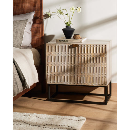 Kelby Cabinet Nightstand by Four Hands in gunmetal, aged brass, light wash carved mango, light wash mango and light wash. Made from solid mango, iron in a rustic style.