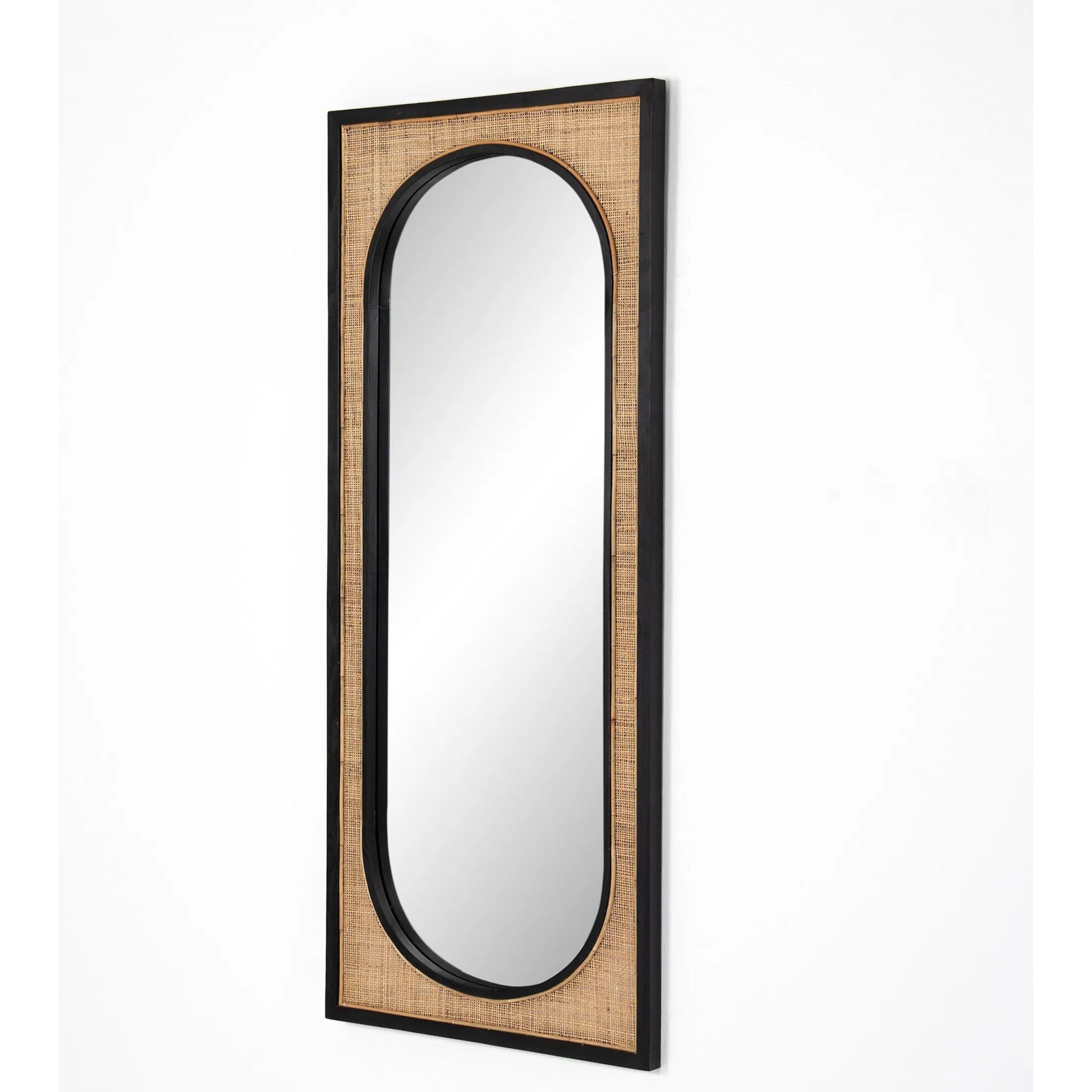 Candon Floor Mirror by Four Hands in ebony black, warm wheat rattan. Made from solid sungkai, rattan in a coastal style.