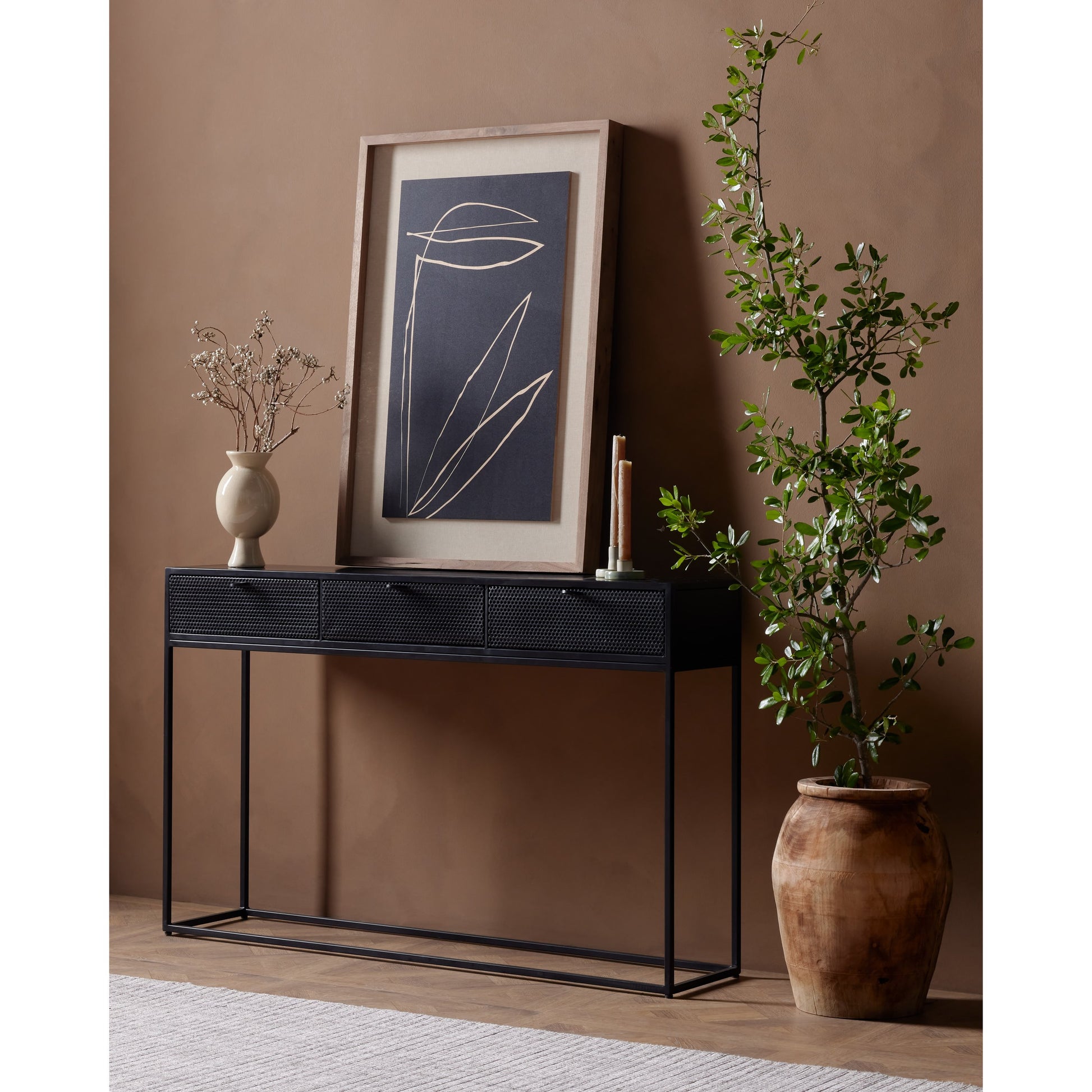 Hendrick Console Table by Four Hands in black, perforated black and black. Made from iron in a modern style.