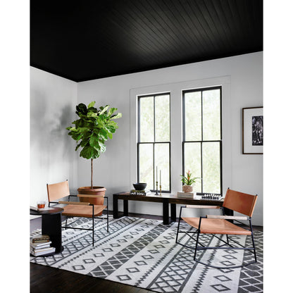 Griffon Side Table by Four Hands in rustic fossil. Made from iron in a modern style.