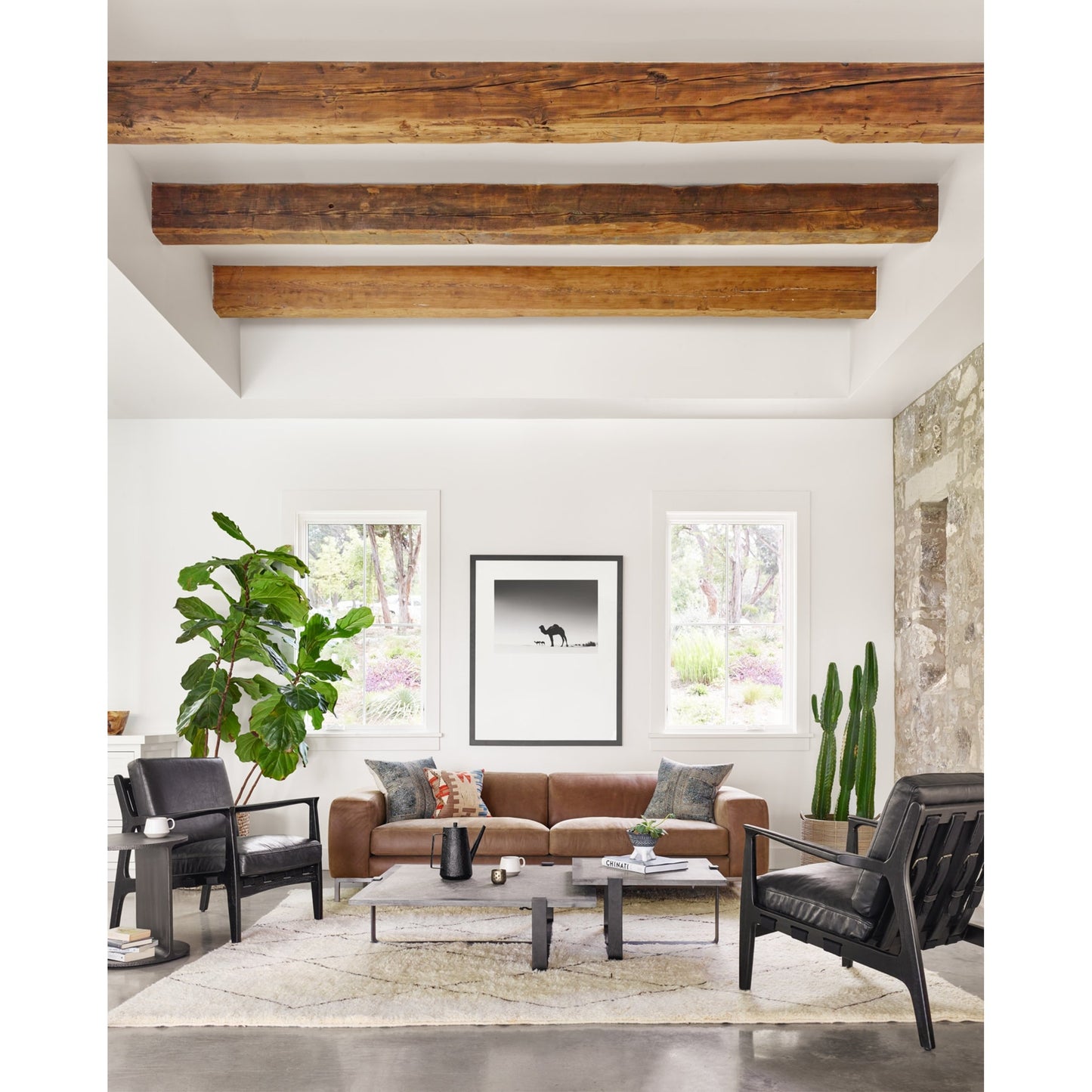 014 SI-1797751 | Lifestyle | Griffon Side Table by Four Hands in rustic fossil. Made from iron in a modern style.