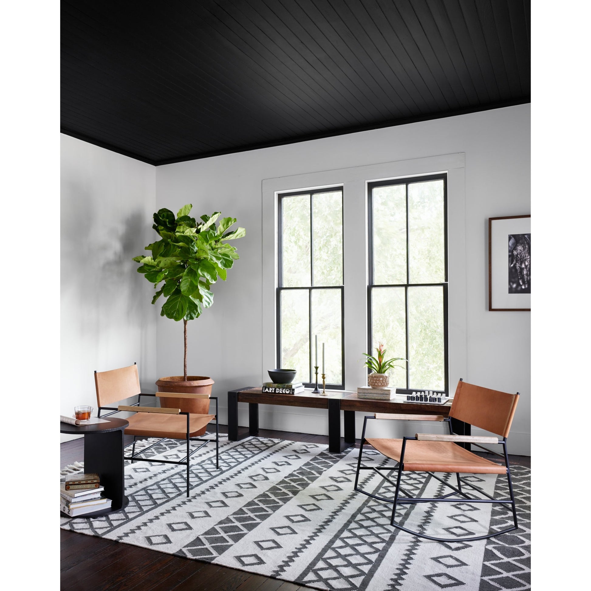 Griffon Side Table by Four Hands in rustic fossil. Made from iron in a modern style.