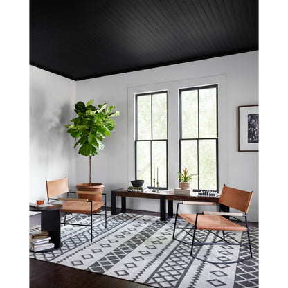 Griffon Side Table by Four Hands in rustic fossil. Made from iron in a modern style.