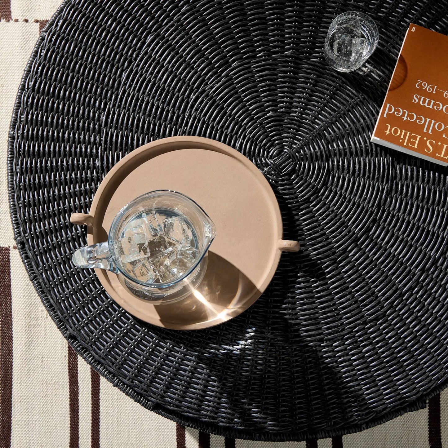 010 SI-1716043 | Closeup | Madura Coffee Table by Four Hands in vintage coal. Made from 100% polyethylene, aluminum in a coastal style.