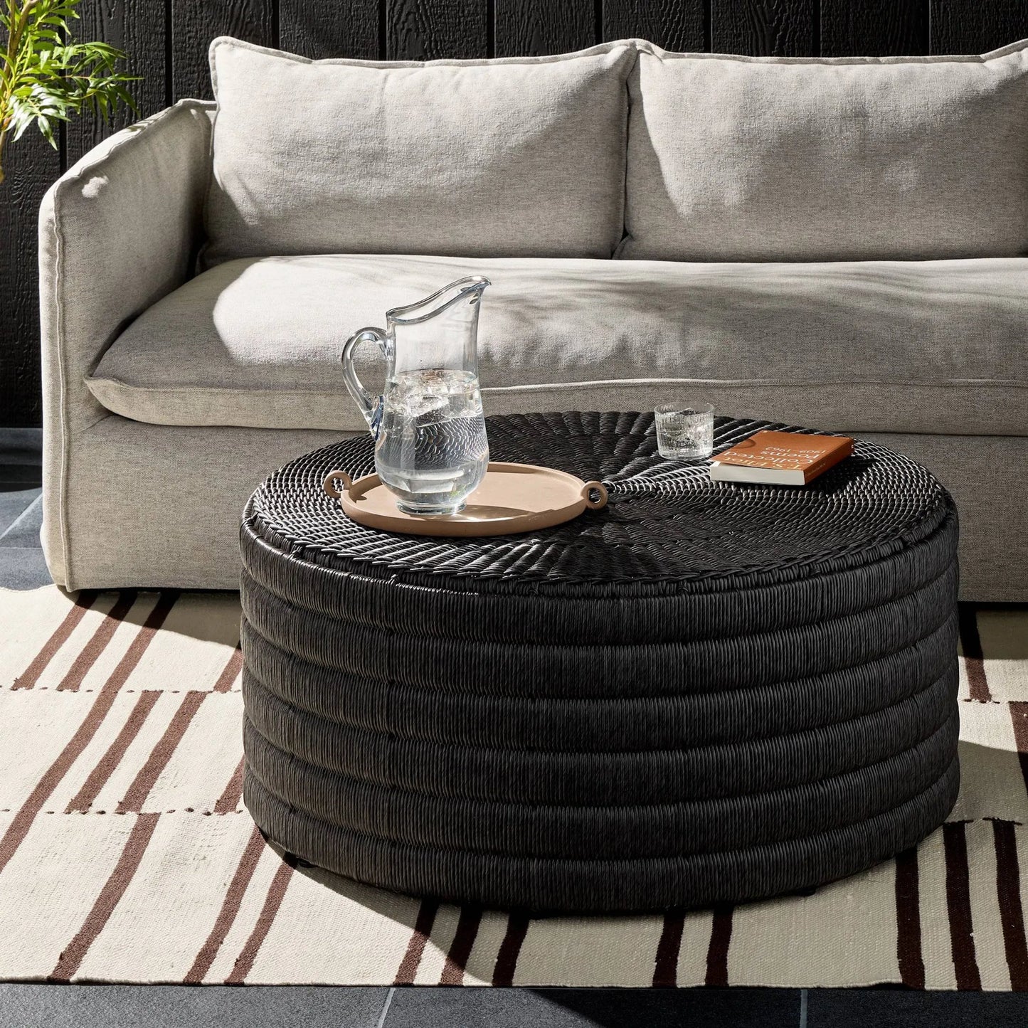 011 SI-1716043 | Lifestyle | Madura Coffee Table by Four Hands in vintage coal. Made from 100% polyethylene, aluminum in a coastal style.