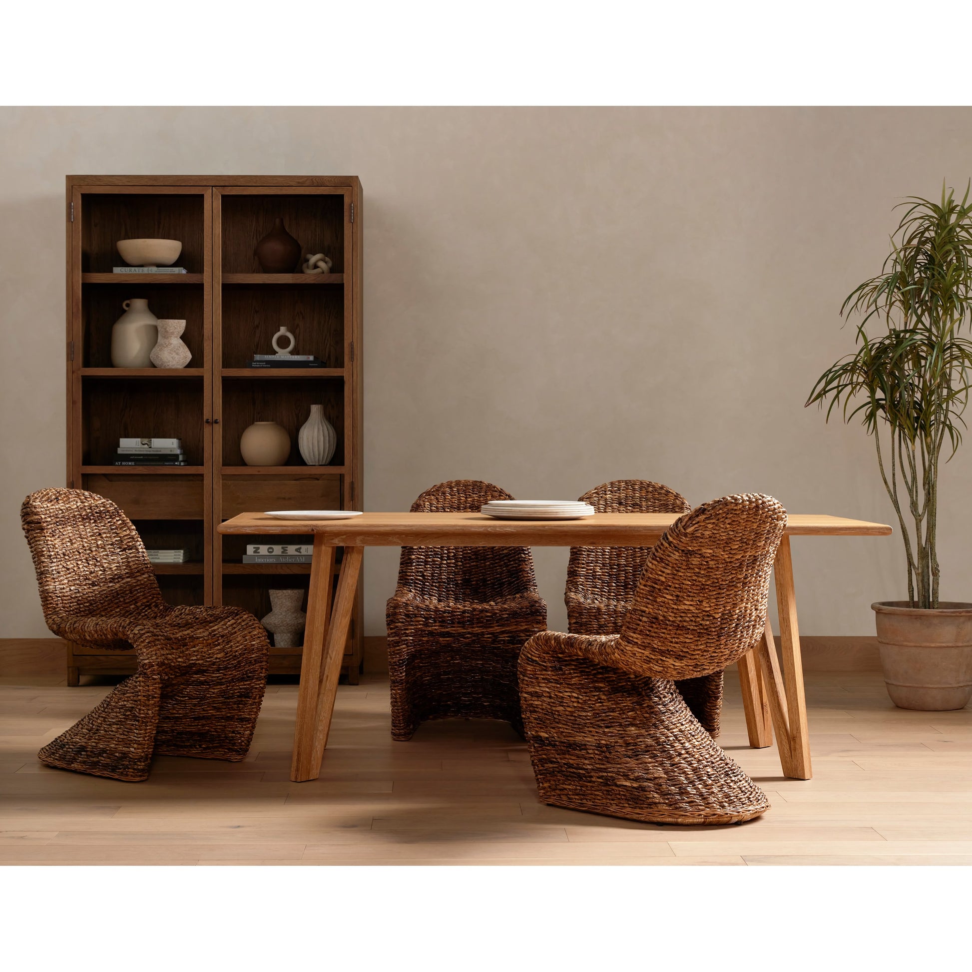 Portia Dining Chair by Four Hands in gray wash. Made from banana leaf, iron in a modern style.