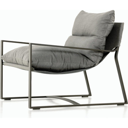 Avon Outdoor Sling Chair by Four Hands in faye sand, bronze. Made from 100% olefin, aluminum, 59% polyurethane foam, 30% polyester fiber, 11% polyester fiber batting in a modern style.