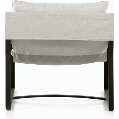 Avon Outdoor Sling Chair by Four Hands in faye sand, bronze. Made from 100% olefin, aluminum, 59% polyurethane foam, 30% polyester fiber, 11% polyester fiber batting in a modern style.