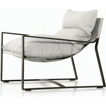 Avon Outdoor Sling Chair by Four Hands in faye sand, bronze. Made from 100% olefin, aluminum, 59% polyurethane foam, 30% polyester fiber, 11% polyester fiber batting in a modern style.