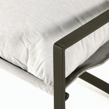 Avon Outdoor Sling Chair by Four Hands in faye sand, bronze. Made from 100% olefin, aluminum, 59% polyurethane foam, 30% polyester fiber, 11% polyester fiber batting in a modern style.