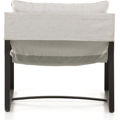 Avon Outdoor Sling Chair by Four Hands in faye sand, bronze. Made from 100% olefin, aluminum, 59% polyurethane foam, 30% polyester fiber, 11% polyester fiber batting in a modern style.