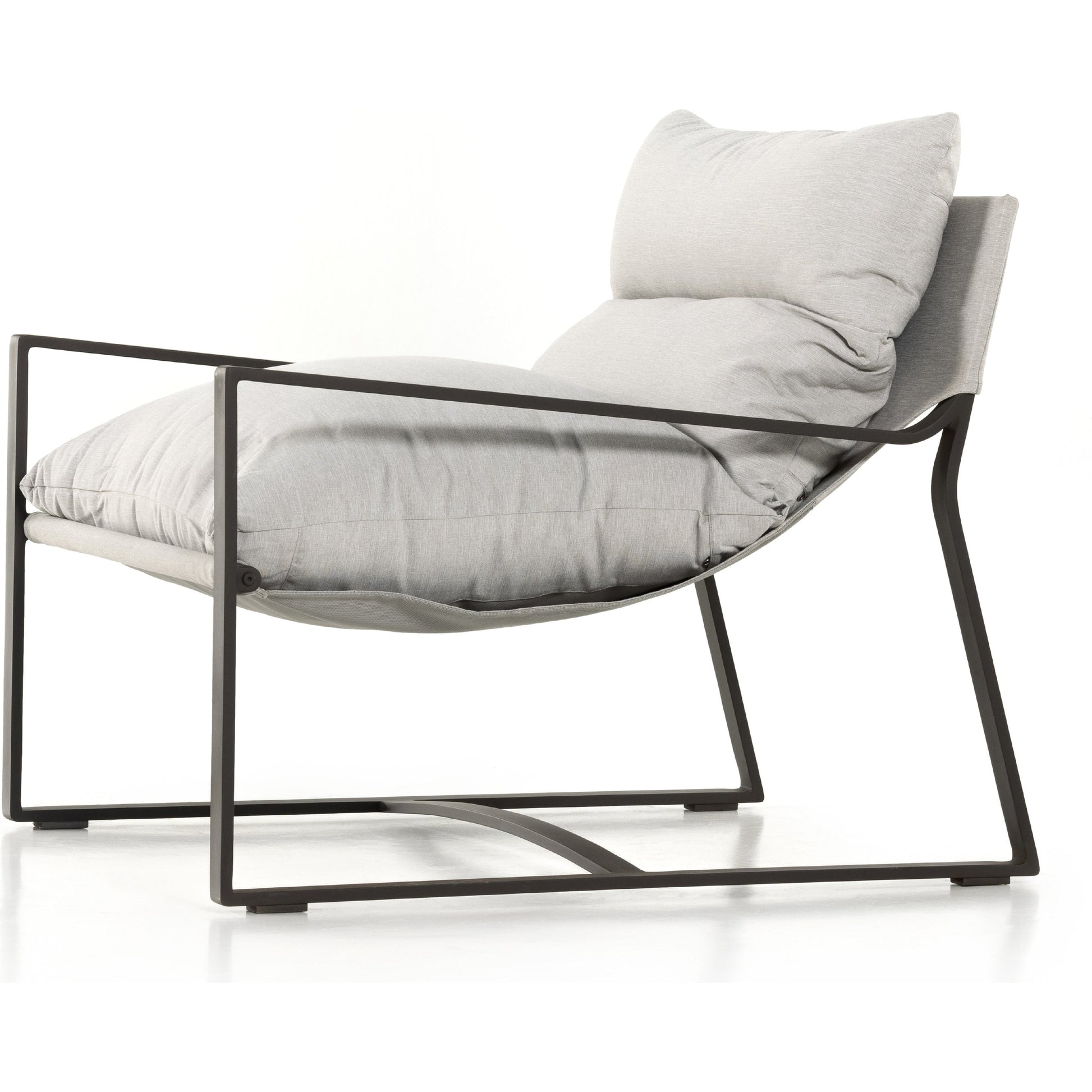 Avon Outdoor Sling Chair by Four Hands in faye sand, bronze. Made from 100% olefin, aluminum, 59% polyurethane foam, 30% polyester fiber, 11% polyester fiber batting in a modern style.
