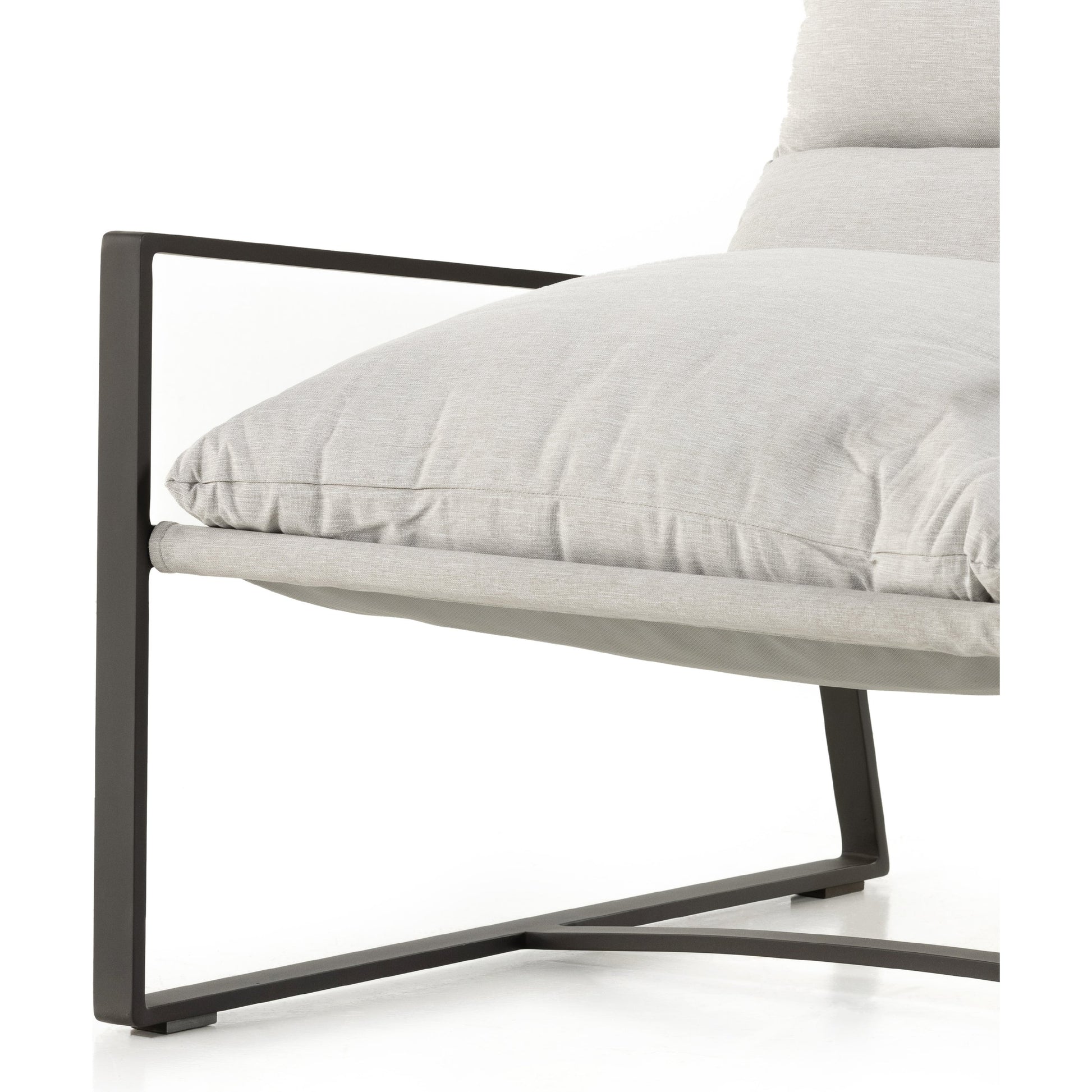 Avon Outdoor Sling Chair by Four Hands in faye sand, bronze. Made from 100% olefin, aluminum, 59% polyurethane foam, 30% polyester fiber, 11% polyester fiber batting in a modern style.