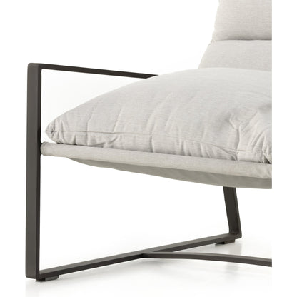 Avon Outdoor Sling Chair by Four Hands in faye sand, bronze. Made from 100% olefin, aluminum, 59% polyurethane foam, 30% polyester fiber, 11% polyester fiber batting in a modern style.