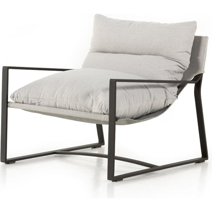 Avon Outdoor Sling Chair by Four Hands in faye sand, bronze. Made from 100% olefin, aluminum, 59% polyurethane foam, 30% polyester fiber, 11% polyester fiber batting in a modern style.