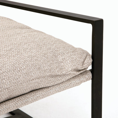 Avon Outdoor Sling Chair by Four Hands in faye sand, bronze. Made from 100% olefin, aluminum, 59% polyurethane foam, 30% polyester fiber, 11% polyester fiber batting in a modern style.