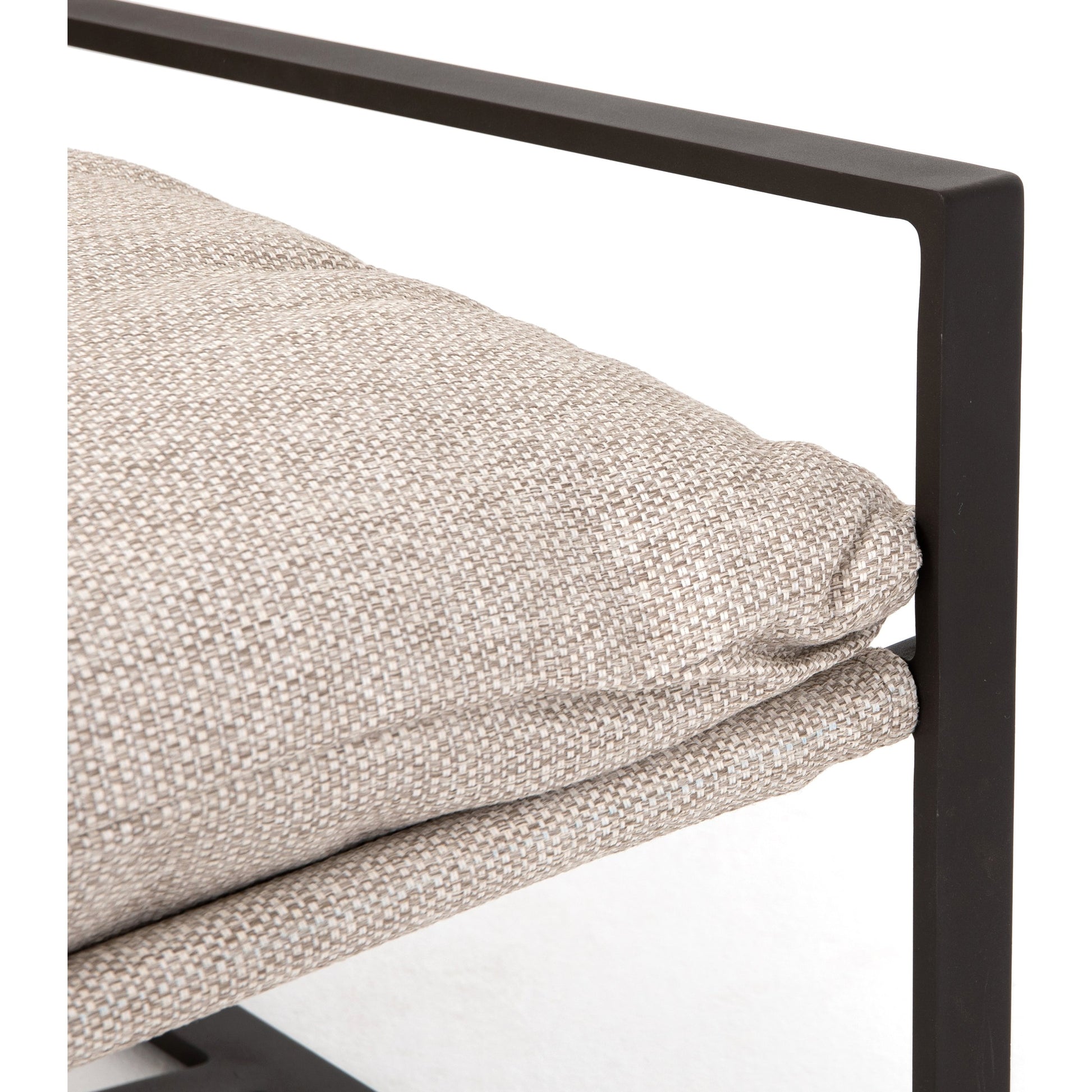 Avon Outdoor Sling Chair by Four Hands in faye sand, bronze. Made from 100% olefin, aluminum, 59% polyurethane foam, 30% polyester fiber, 11% polyester fiber batting in a modern style.