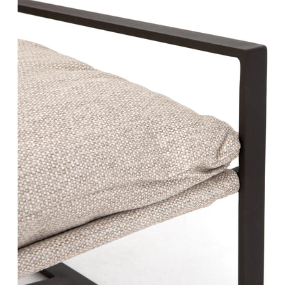 Avon Outdoor Sling Chair by Four Hands in faye sand, bronze. Made from 100% olefin, aluminum, 59% polyurethane foam, 30% polyester fiber, 11% polyester fiber batting in a modern style.