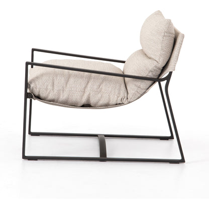 Avon Outdoor Sling Chair by Four Hands in faye sand, bronze. Made from 100% olefin, aluminum, 59% polyurethane foam, 30% polyester fiber, 11% polyester fiber batting in a modern style.