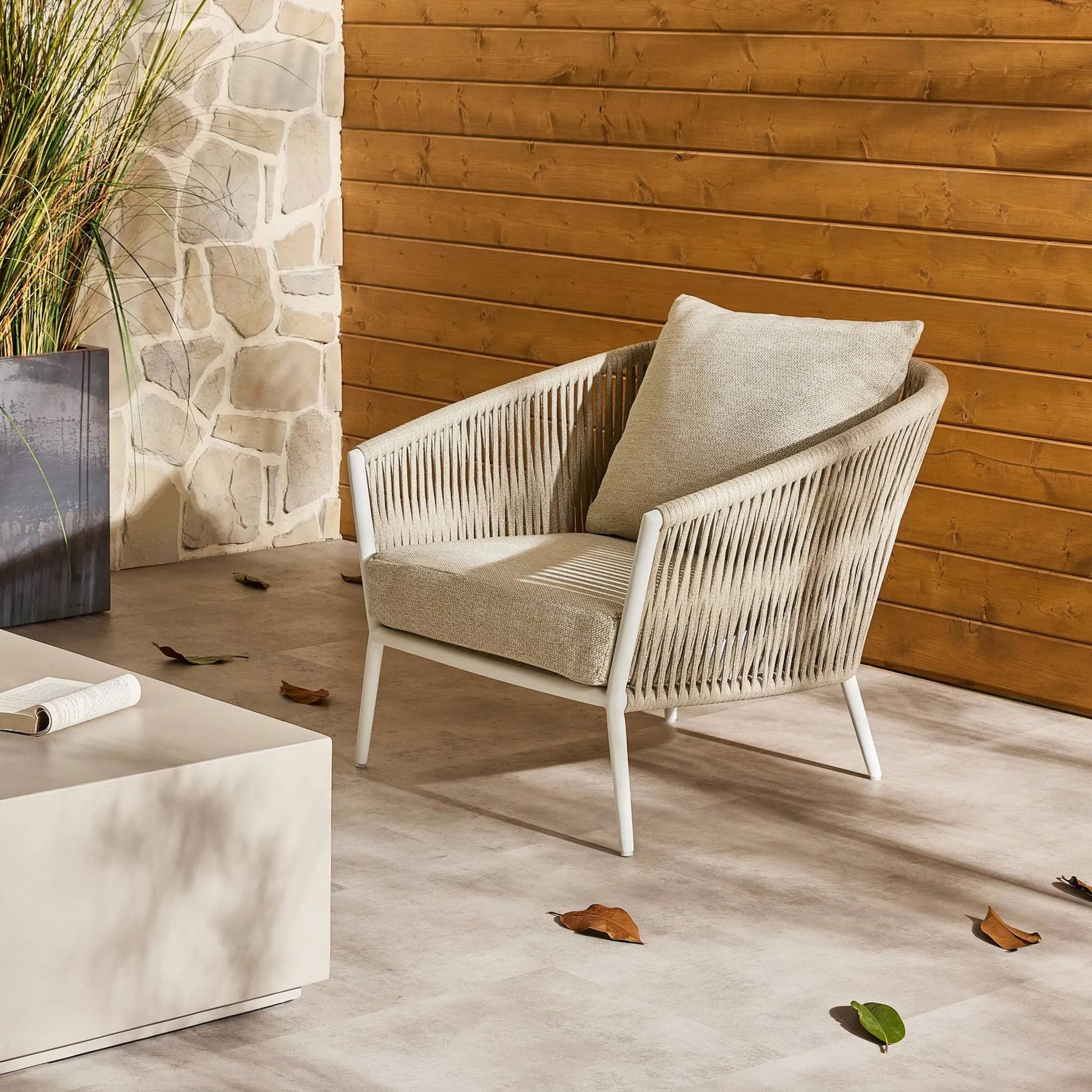 Porto Outdoor Chair by Four Hands. Made from 100% olefin, aluminum, 100% polypropylene in a modern style.