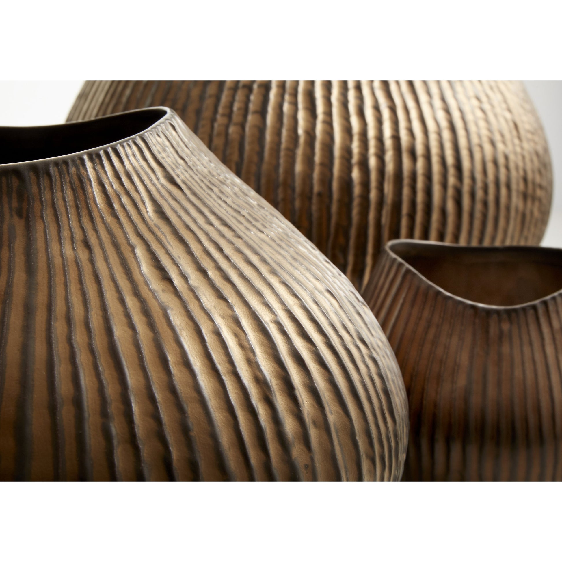 Arpeggi Candleholder by Cyan Design in gold. Made from ceramic in a eclectic & global style.